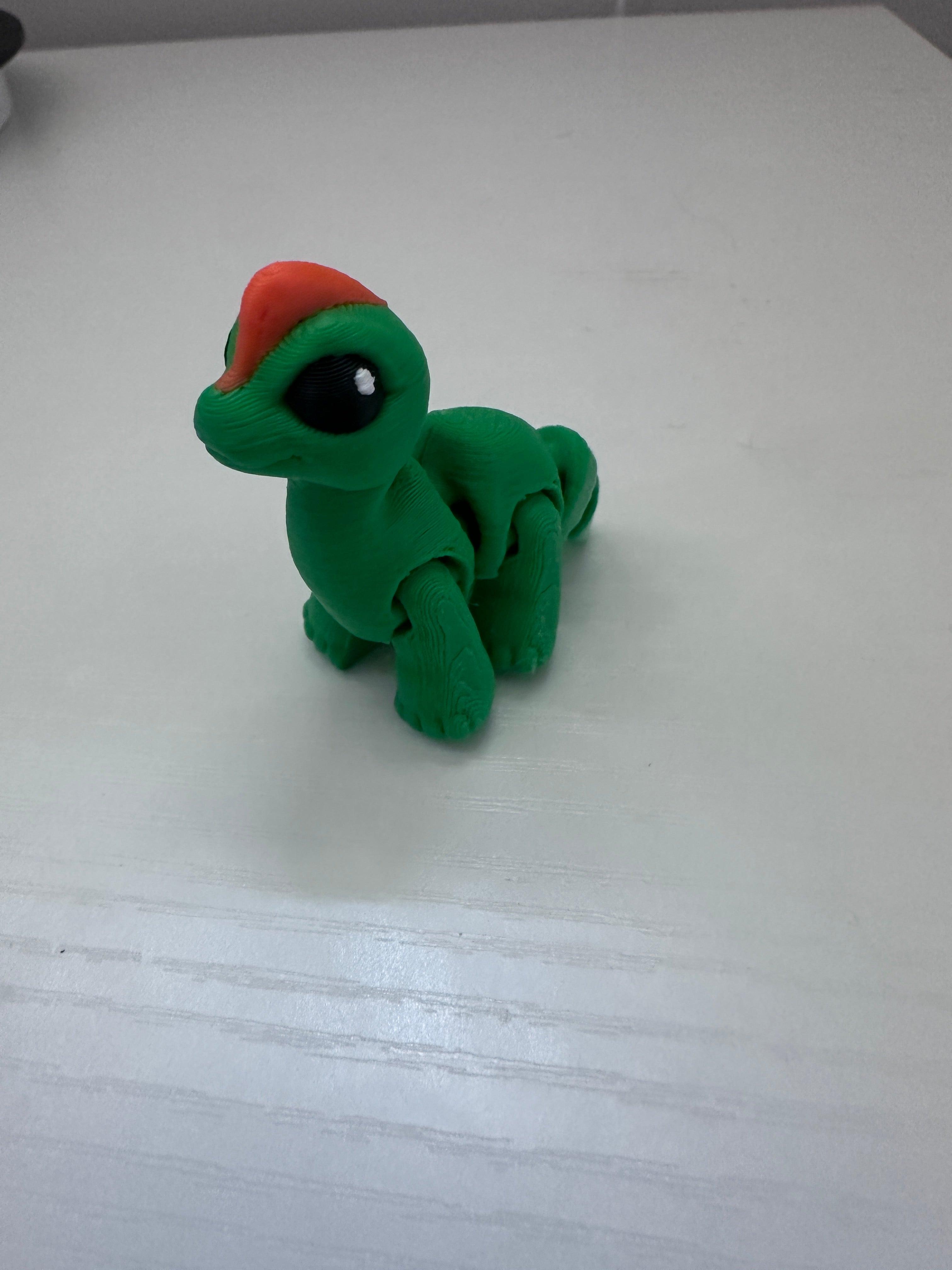 Tiny Articulated Long Neck Dinosaur – 3D Printed Flexi Dinosaur | Pocket-Sized Collectible & Fidget Toy